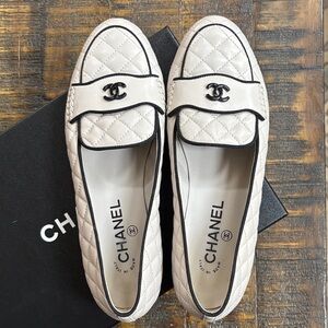 CHANEL Cream Quilted Flats with Black Trim